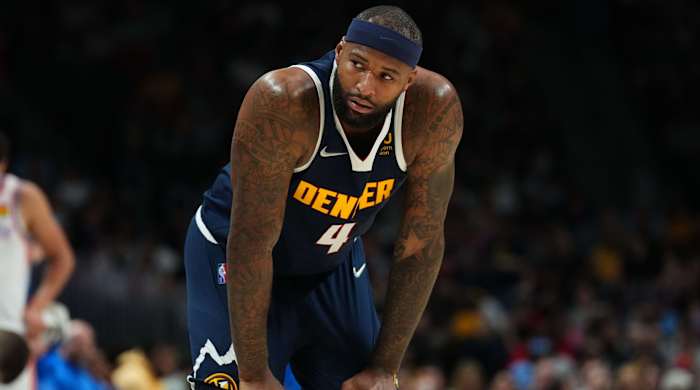Nuggets center DeMarcus Cousins (4) looks on during the second quarter of a game against the Thunder.